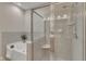 Relaxing bathroom showcasing a separate shower and soaking tub at 9005 River Estates Dr, Knightdale, NC 27545