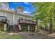 Back exterior of house with deck, stairs, and backyard at 9005 River Estates Dr, Knightdale, NC 27545
