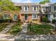 Charming brick townhouse with a well-maintained front yard and inviting curb appeal at 1020 Randolph Ct, Cary, NC 27511