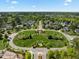 Beautiful aerial view of a meticulously landscaped neighborhood roundabout and green space at 1033 Laredo Ln, Durham, NC 27703
