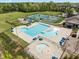 A great view of community amenities featuring pool, tennis courts and playground at 1033 Laredo Ln, Durham, NC 27703