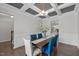 Dining room with coffered ceilings, chandelier lighting, and views to other rooms at 1033 Laredo Ln, Durham, NC 27703