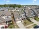 Charming two-story home with well-maintained landscaping in a Gathering-friendly neighborhood at 1033 Laredo Ln, Durham, NC 27703