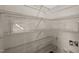 Organized pantry with wire shelving, clear storage bins, and ample space for storing household items at 1033 Laredo Ln, Durham, NC 27703