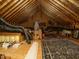 Spacious attic storage area featuring exposed wooden beams and ample room for organizing belongings at 105 Hein Dr, Clayton, NC 27527