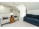 Spacious bonus room featuring comfortable seating and a versatile layout at 105 Hein Dr, Clayton, NC 27527
