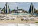 Inviting community pool with lounge chairs and umbrellas, ideal for relaxing and socializing at 105 Hein Dr, Clayton, NC 27527