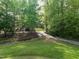 Scenic view of lush greenery and a charming bridge enhancing the natural beauty of the landscape at 105 Hein Dr, Clayton, NC 27527