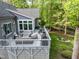 Spacious deck with covered seating area, perfect for outdoor entertaining or relaxation at 105 Hein Dr, Clayton, NC 27527