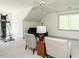 Relaxing sitting room with ceiling fan, natural light and cozy furniture at 105 Hein Dr, Clayton, NC 27527