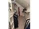 Well-organized walk-in closet with shelving, hanging rods, and ample storage space at 105 Hein Dr, Clayton, NC 27527