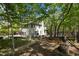 An aerial view of the backyard with trees surrounding the house at 107 Deer St, Carrboro, NC 27510