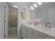 Bathroom featuring a double vanity with marble countertops at 107 Deer St, Carrboro, NC 27510