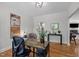 Home office with hardwood floors, neutral walls, and a functional desk, designed for a productive and comfortable workspace at 107 Deer St, Carrboro, NC 27510