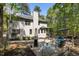 View of the backyard featuring a gas heater, outdoor seating, and patio at 107 Deer St, Carrboro, NC 27510