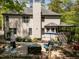 Outdoor patio featuring stone pavers, comfortable seating, and an outdoor gas heater at 107 Deer St, Carrboro, NC 27510