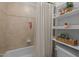 Classic bath and shower combination with well-maintained tiled surfaces at 107 Deer St, Carrboro, NC 27510