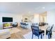 Open-concept living area with modern furnishings and plenty of natural light at 108 Red Maple St, Sanford, NC 27332