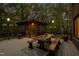 Backyard deck with a covered picnic area, perfect for outdoor dining and entertaining in a serene setting at 10805 The Olde Pl, Raleigh, NC 27614