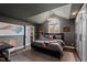 Spacious bedroom with hardwood floors, gray walls, and custom built-in cabinets at 10805 The Olde Pl, Raleigh, NC 27614