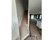 View of the staircase and living room area that features gray accent walls and open floor plan at 1106 Brookrun Dr, Oxford, NC 27565