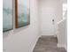 Welcoming entryway features wood-look floors, a white front door, and neutral paint at 112 Red Maple St, Sanford, NC 27332