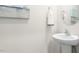 Simple powder room with a pedestal sink and modern fixtures at 112 Red Maple St, Sanford, NC 27332