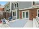 Outdoor deck featuring comfortable seating and a view of the home's brick exterior at 120 Barbary Ct, Cary, NC 27511