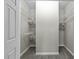 Walk-in closet featuring wire shelving for optimal storage at 1234 Shadowbark Ct, Raleigh, NC 27603