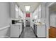 Spacious kitchen featuring white cabinets and stainless steel appliances at 1234 Shadowbark Ct, Raleigh, NC 27603