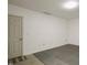 Unfinished basement with door to the exterior at 126 W Savannah Ridge Rd, Holly Springs, NC 27540