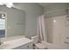 A bathroom with a tub and sink at 126 W Savannah Ridge Rd, Holly Springs, NC 27540