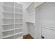 Walk-in closet with built-in shelving and racks for clothing storage at 1306 Mordecai Dr, Raleigh, NC 27604