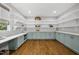 Spacious walk-in pantry with ample shelving, counter space, and custom cabinets at 1306 Mordecai Dr, Raleigh, NC 27604