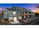 Multi-level townhomes featuring a private garage, deck and well-maintained landscaping at 133 Pearl St # 7, Garner, NC 27529