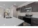 Well-equipped kitchen with stainless steel oven, microwave, and ample counter space at 133 Pearl St # 7, Garner, NC 27529