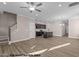 Spacious living room with a staircase, and an open flow to the modern kitchen at 133 Pearl St # 7, Garner, NC 27529