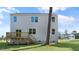 New two-story home featuring a deck and a spacious backyard, perfect for outdoor enjoyment at 138 Fair Child Rd, Spring Lake, NC 28390