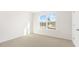 Bright bedroom with a large window and neutral carpeting, ready for personalization at 138 Fair Child Rd, Spring Lake, NC 28390