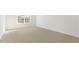 Bedroom featuring neutral carpeting and white walls, with lots of natural light at 138 Fair Child Rd, Spring Lake, NC 28390