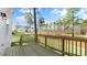 New home with a wooden deck that provides outdoor living space overlooking the backyard at 138 Fair Child Rd, Spring Lake, NC 28390