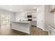 Kitchen featuring gray cabinetry, stainless steel appliances, granite countertops, and access to the patio at 138 Fair Child Rd, Spring Lake, NC 28390
