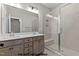Bathroom features double vanity, large mirror and glass enclosed shower at 141 Pearl St # 9, Garner, NC 27529