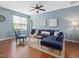 Bright living room featuring a stylish interior and wood flooring at 1605 Grace Point Rd, Morrisville, NC 27560