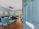View from front door into living room with hardwood floors and furniture at 1605 Grace Point Rd, Morrisville, NC 27560