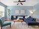 Cozy living room features comfortable furniture, wood floors, and ample natural light at 1605 Grace Point Rd, Morrisville, NC 27560