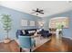 Bright living room featuring stylish decor, wood floors, and ample natural light at 1605 Grace Point Rd, Morrisville, NC 27560