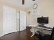 Bright office space featuring a built-in desk, and view to large closet and adjacent rooms at 1605 Grace Point Rd, Morrisville, NC 27560