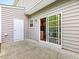 Back patio with door to the kitchen at 1605 Grace Point Rd, Morrisville, NC 27560