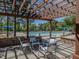 Relax in style with poolside pergola seating, offering shade and comfort at the community pool at 1605 Grace Point Rd, Morrisville, NC 27560